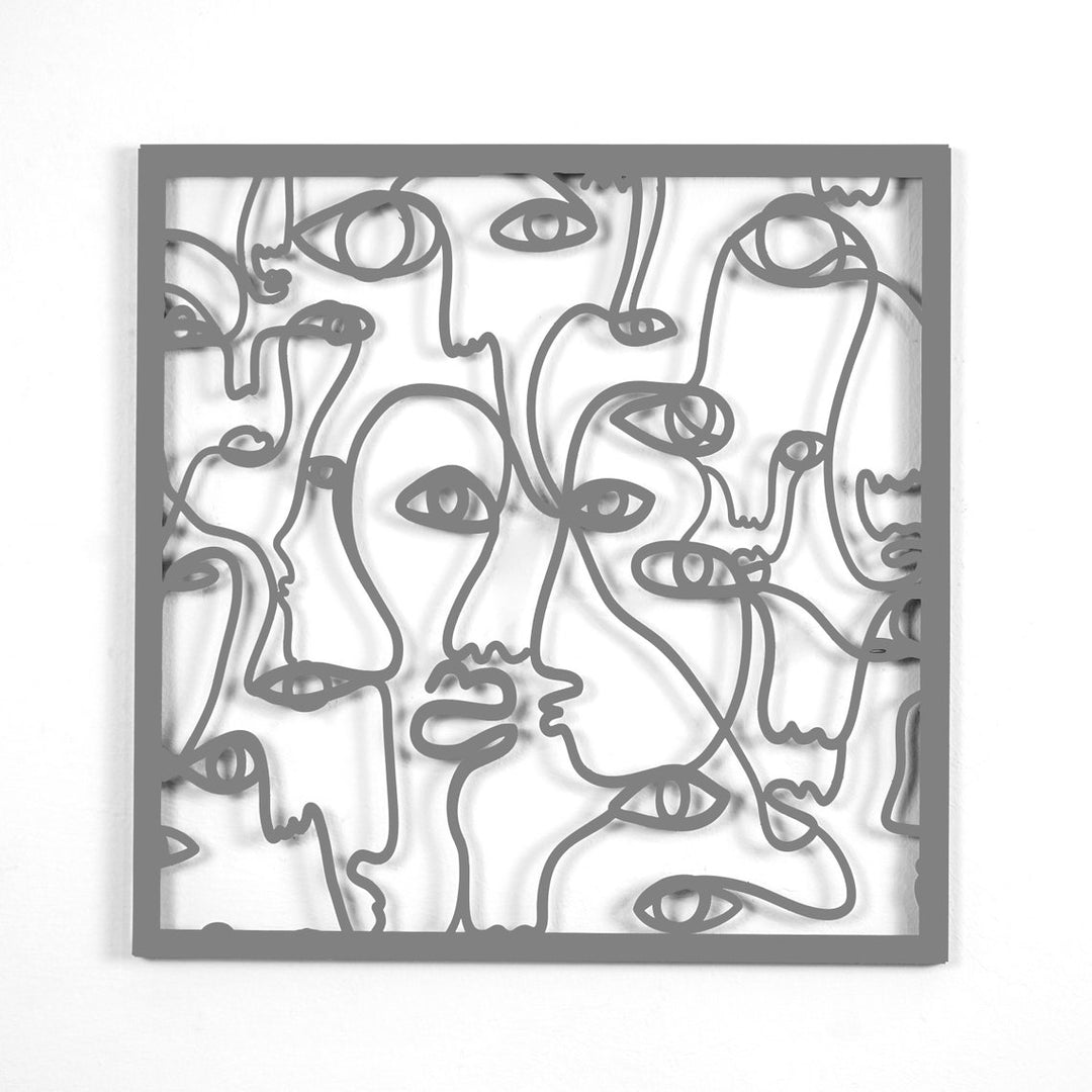 modern-tasarımlı-soyut-yüzler-metal-duvar-tablosunun-detay-görünümü